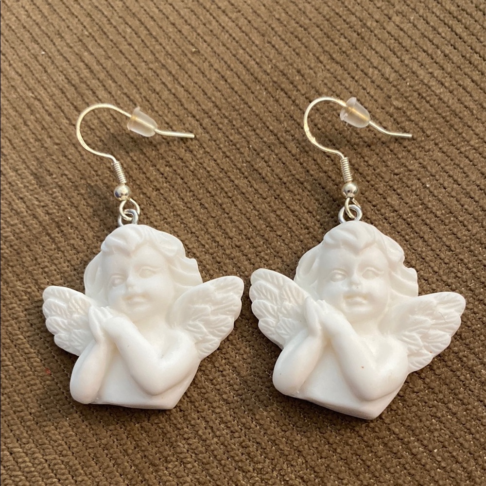 White cherub angel dangle earrings